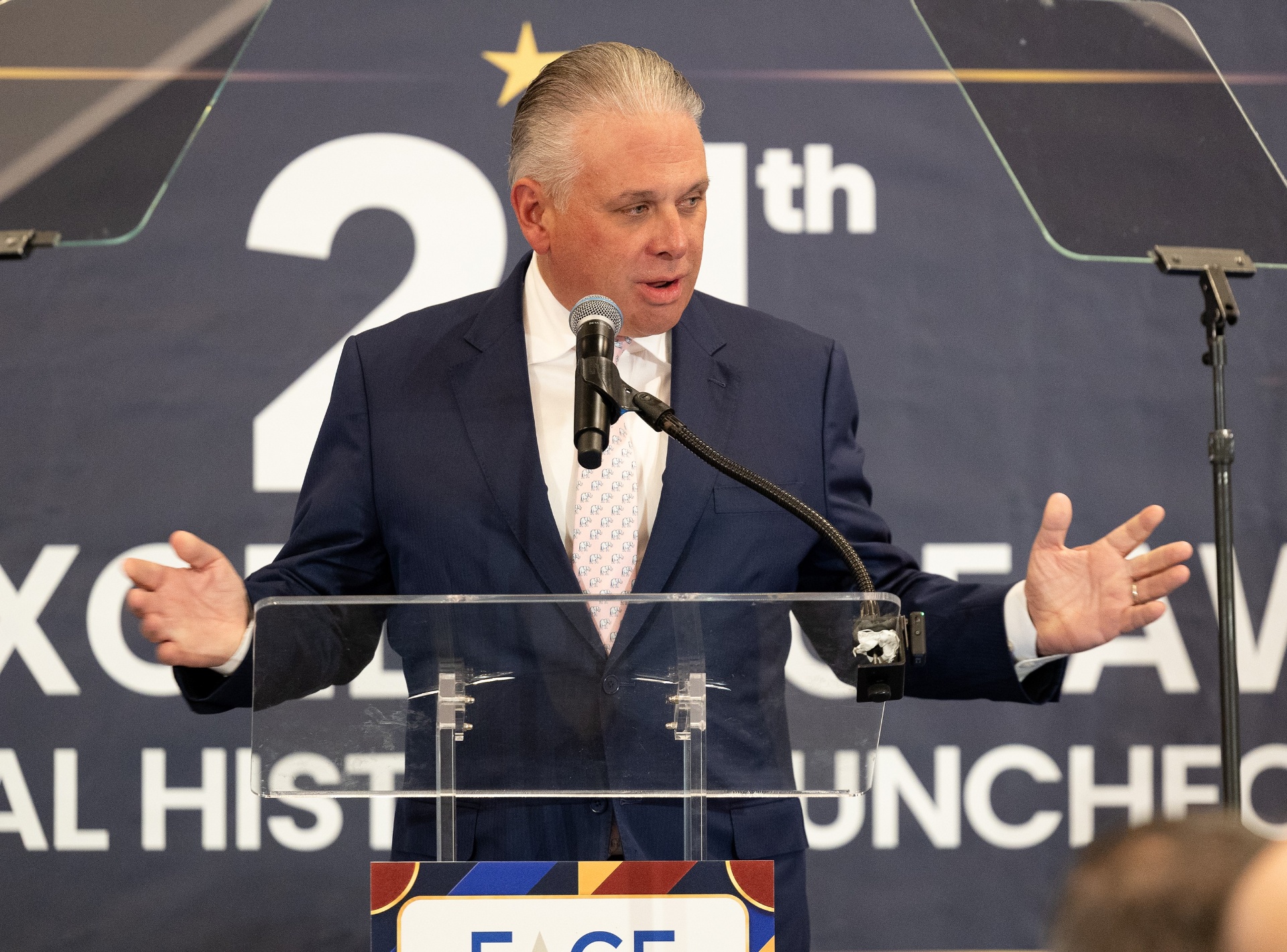 A Cuban-American leader addressing a FACE convening
